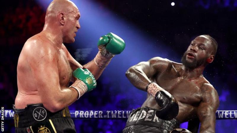 Tyson Fury beats Deontay Wilder in world title fight in Las Vegas