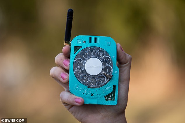 Space engineer builds a mobile phone from scratch with an old-school ROTARY DIAL 'because she hates smartphone culture and texting'