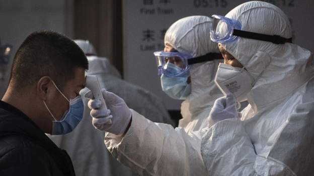 China locks down 400,000 people after virus spike